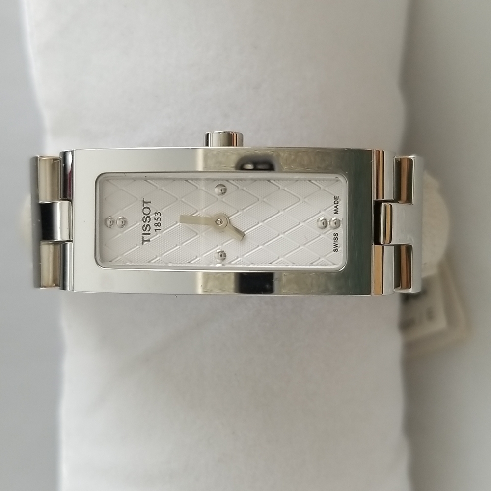 Tissot women watch. New with original box.  In excellent condition.